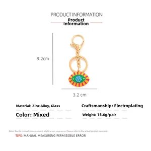 Detailed specs of the colorful Evil Eye keychain with dimensions 9.2cm x 3.2cm and weight 15.6g