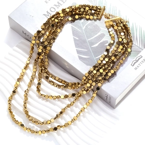 Vintage gold layered beaded necklace with multi-strand waterfall design and T-bar clasp