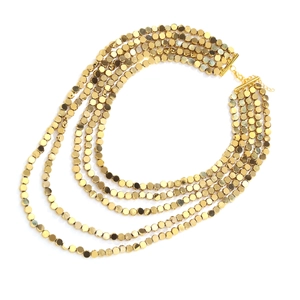 Vintage multi-layer gold sequin beaded necklace featuring a metallic waterfall design