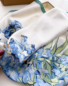 Close-up of artistic Van Gogh iris floral print on silk scarf with smooth texture