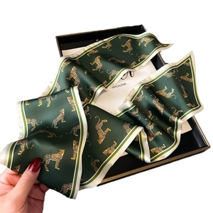 Elegant forest green leopard print skinny silk scarf with diagonal ends for women