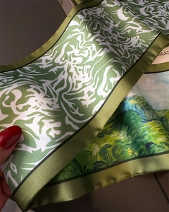 Close-up of double-sided silk scarf featuring Van Gogh oil painting and abstract patterns