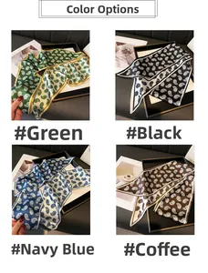 Close-up of slim paisley silk scarves in green, black, navy, and coffee brown colors
