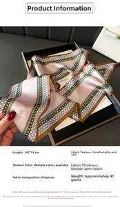 Detailed close-up of double-layered pink silk scarf with geometric border texture
