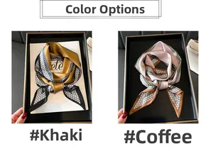 Detail view of khaki and coffee geometric patterned silk scarves on display trays