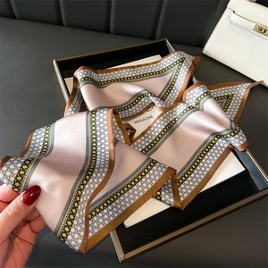 Elegant pink and gold silk scarf with geometric diamond patterns for women