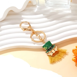 St. Patrick's Day leprechaun keychain with green hat clover pendant and yellow tassel fringe