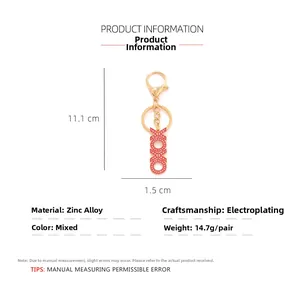 Zinc alloy XOXO keychain with red enamel charms and dimensions of 11.1cm in length