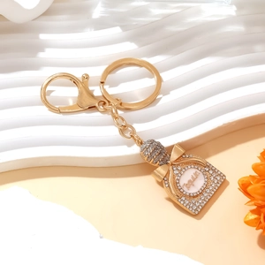 Sparkling gold Tequila bottle keychain with rhinestone inlay and lobster clasp