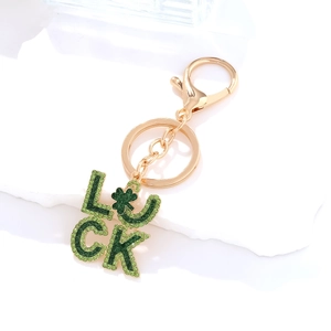 Green luck clover keychain with gold plating and sparkling emerald rhinestones