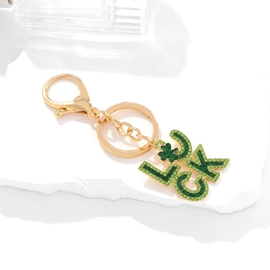 Golden keychain with green rhinestone LUCK letter pendant and small four-leaf clover charm