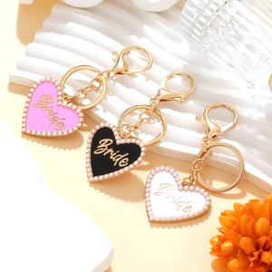Enamel heart Bride keychains with pearls in pink, black and white for wedding gifts