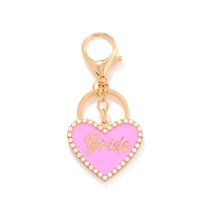 Pink heart keychain with golden Bride text and white pearl border on gold-tone ring