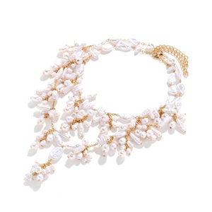 Baroque pearl tassel necklace set with irregular pearls and layered gold chains