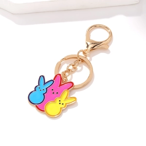 Colorful Easter rabbit enamel keychain with three layered bunnies and gold metal hardware