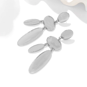 Modern minimalist silver geometric drop earrings featuring layered irregular metal plates