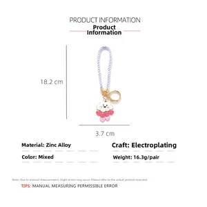 Detail view of cloud and heart keychain with dimensions 18.2cm and 16.3g weight