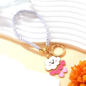 Handmade enamel heart and cloud keychain with purple braided rope and gold metal ring