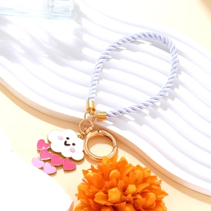 Handmade light purple rope keychain with smiling cloud and pink heart pendants