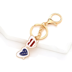 Fashionable golden heart sunglasses keychain with American flag enamel and lobster clasp
