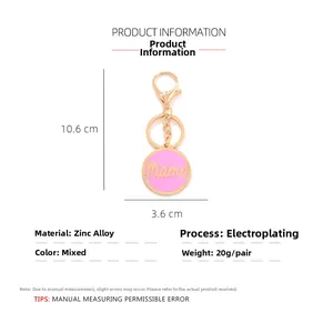 Detailed view of the pink enamel Mama pendant keychain with dimensions and gold alloy finish