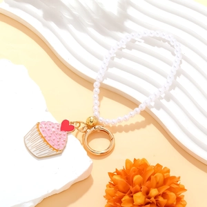 Cute enamel cupcake pendant keychain with white pearls and heart charm for bags