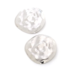 Irregular hammered metal earrings with a textured silver finish in a minimalist style