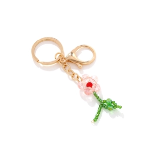 Handgefertigter Schlüsselanhänger mit Kristallblume, rosa Perlen und goldenem Verschluss