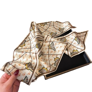 Retro silk-like neck scarf with butterfly and chain print in cream and gold