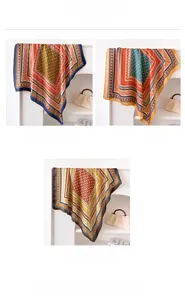 Detailed view of geometric pattern silk scarves in navy blue, khaki, and brown borders