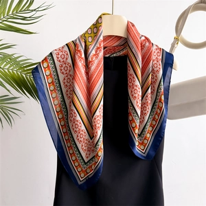 Retro silk-like square scarf featuring vintage floral prints in red, yellow, and blue hues