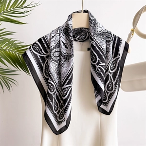 70cm black and white paisley print silk satin square scarf displayed on white mannequin