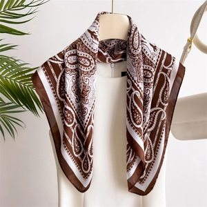 Brown paisley silk-like 70cm square scarf with vintage pattern hanging on a rack