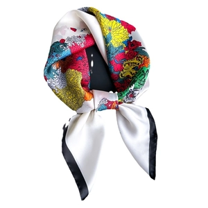 Floral print ivory satin scarf with colorful botanical patterns and black rolled edges