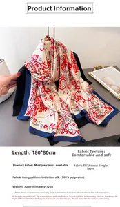 Close-up of 180x80cm faux silk shawl featuring red paisley patterns and 100% polyester fabric