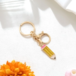 Portachiavi a matita in smalto giallo con strass e finitura in lega dorata