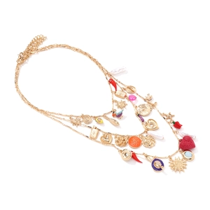 Bohemian multilayer gold necklace with colorful charms like sun, heart, and faux pearls