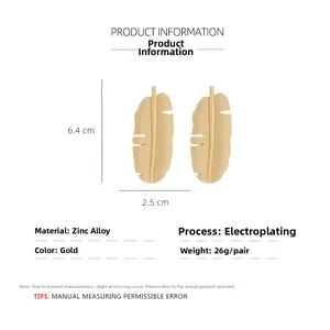Detailed view of gold banana leaf earrings with zinc alloy texture and dimensions