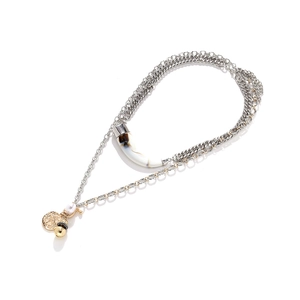 Bohemian multi-layer necklace with horn pendant and mixed gold and silver metal chains