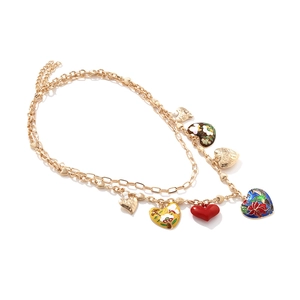 Collier doré double épaisseur avec breloques cœur, oiseau et fleurs en émail coloré