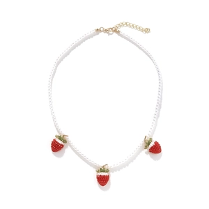 Baroque faux pearl necklace featuring three dimensional red strawberry fruit pendants