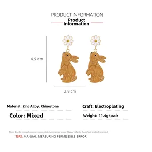 Detail view showing enamel rabbit and daisy earrings dimensions and material specs