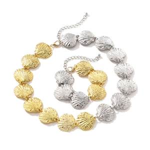 Ocean-inspired two-tone alloy shell necklace and bracelet set with delicate textures