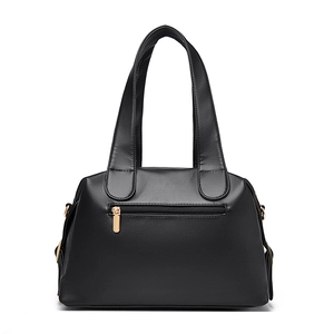 Klassieke zwarte leren shopper voor dames met goudkleurige hardware en een ritsvak achterop