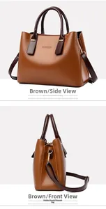 Dettaglio della grande borsa tote in pelle marrone con texture fine e logo dorato