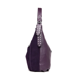 Purple hobo shoulder bag in pebbled leather with suede panels and tassel detail