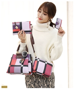 Close-up of a four-piece handbag set featuring geometric color blocking and furry charm