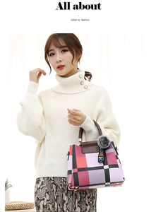Close-up of color-block tote with geometric patterns, pom-pom charm and LOVE strap detail