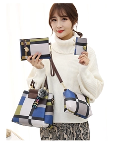 Detail of a 4-piece fashion handbag set featuring geometric patterns and a plush charm