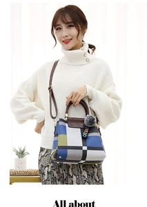 Detail of multi-color geometric patchwork tote bag with fur ball and LOVE LO charm